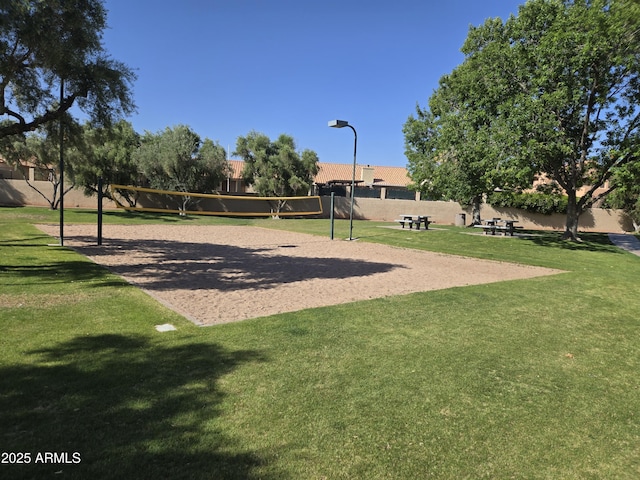 view of property's community featuring volleyball court