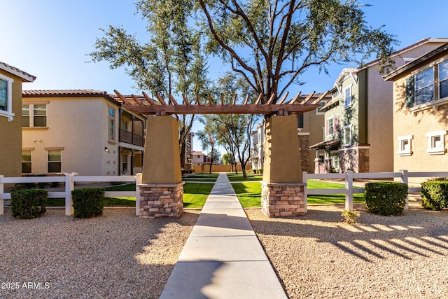 surrounding community featuring a pergola