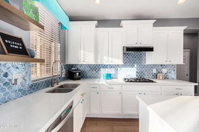 kitchen featuring white cabinetry, extractor fan, gas stovetop, dishwasher, and sink