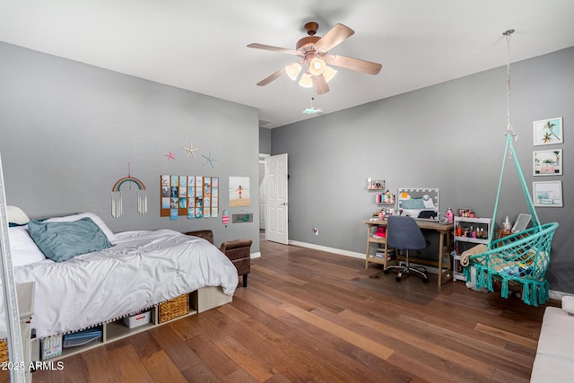 bedroom with ceiling fan and wood-type flooring