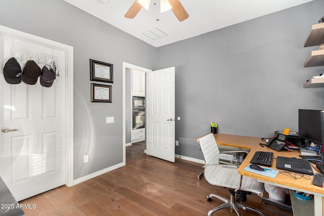 office area featuring ceiling fan and hardwood / wood-style flooring