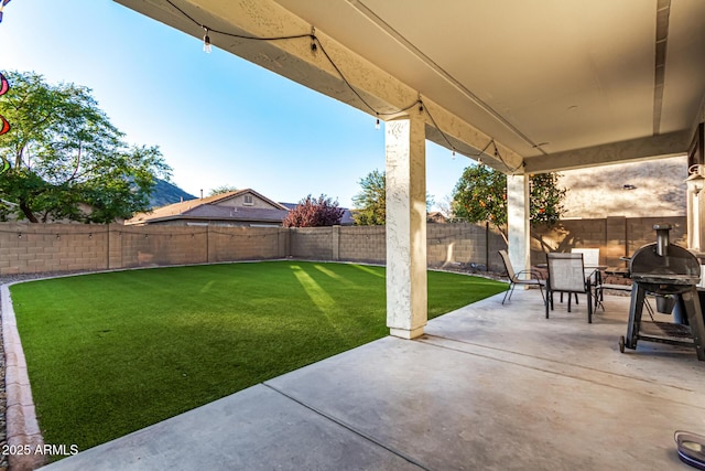 view of patio / terrace featuring a grill