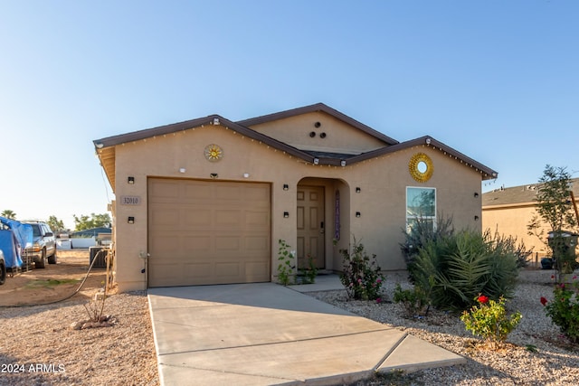 view of front of property with a garage