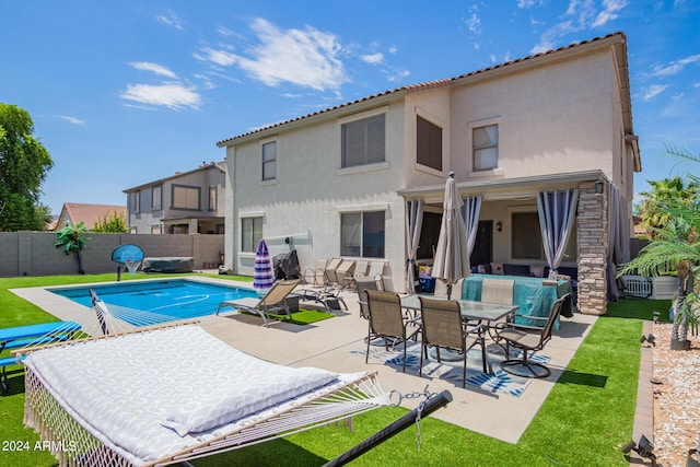 view of pool featuring a patio, a fenced backyard, and a fenced in pool