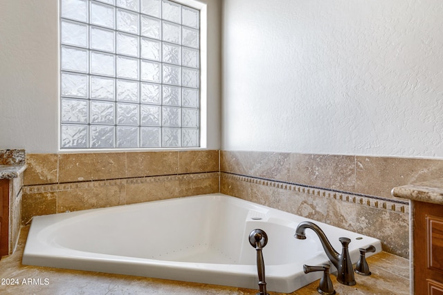 bathroom featuring vanity and plenty of natural light