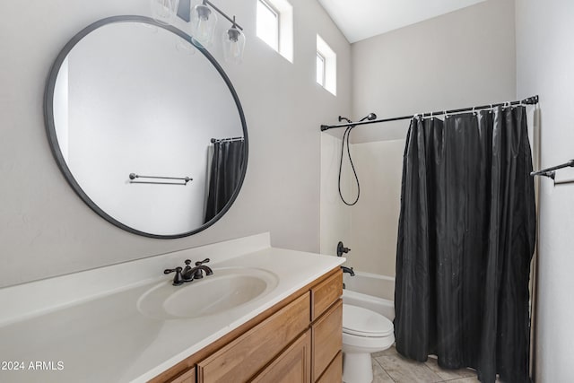 full bathroom with toilet, vanity, shower / bath combo with shower curtain, and tile patterned flooring