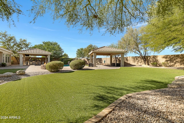 view of yard featuring a patio and a gazebo