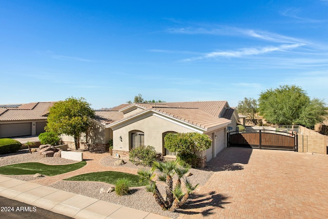 view of front of property with a garage