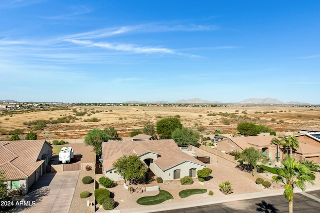 birds eye view of property featuring a mountain view