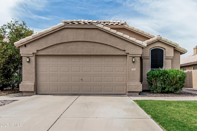 3856 E Encinas Ave, Gilbert, AZ 85234 - view of front facade featuring an attached garage, concrete driveway, stucco siding, and a tiled roof