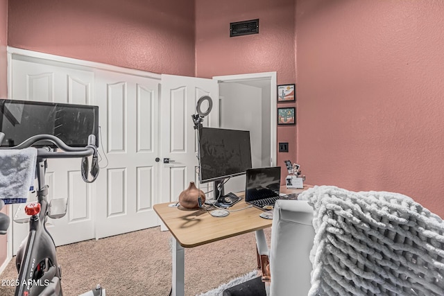 3856 E Encinas Ave, Gilbert, AZ 85234 - carpeted living room featuring a textured wall and a desk