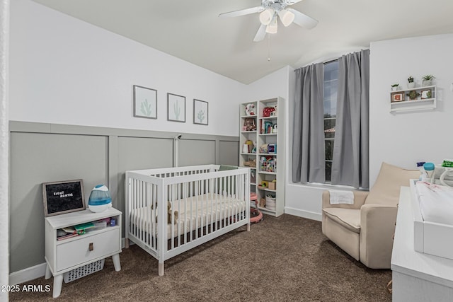 3856 E Encinas Ave, Gilbert, AZ 85234 - carpeted bedroom with a nursery area, a wainscoted wall, and ceiling fan