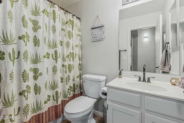 3856 E Encinas Ave, Gilbert, AZ 85234 - bathroom with toilet, vanity, a textured wall, and a shower with curtain