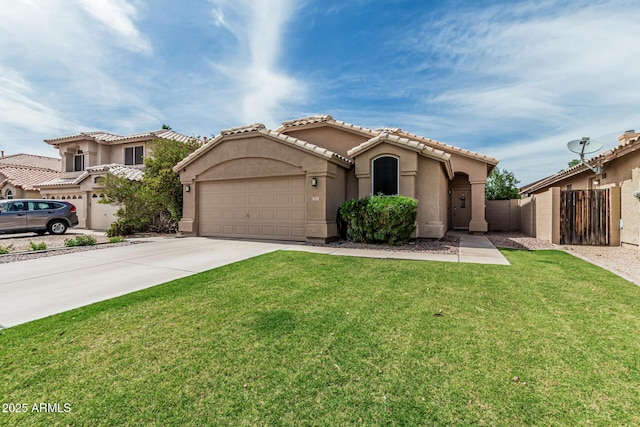 3856 E Encinas Ave, Gilbert, AZ 85234 - mediterranean / spanish home with an attached garage, stucco siding, driveway, and a gate