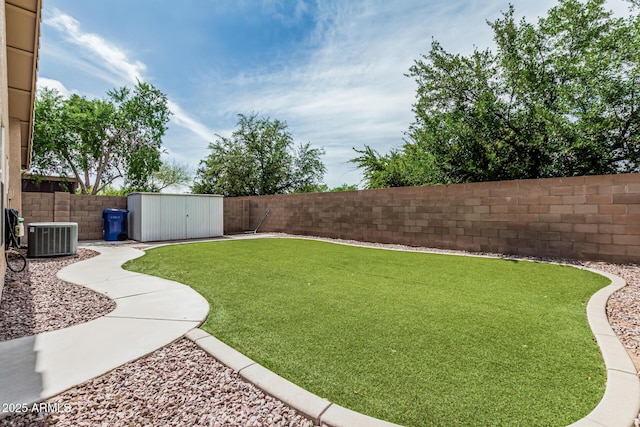 3856 E Encinas Ave, Gilbert, AZ 85234 - view of yard with central AC, a storage unit, and an outdoor structure