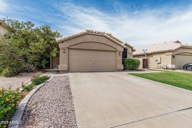 3856 E Encinas Ave, Gilbert, AZ 85234 - view of front facade with driveway, a garage, stucco siding, and fence
