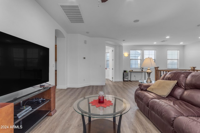 living room with light hardwood / wood-style floors