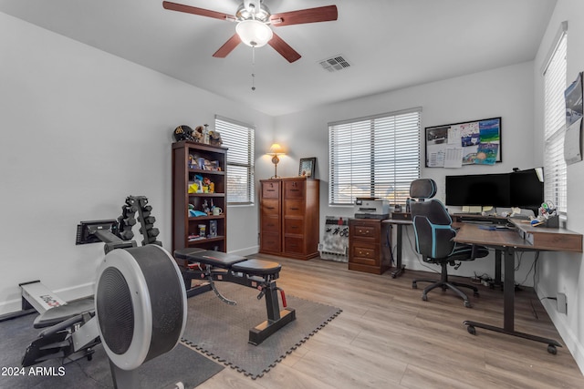 office space featuring ceiling fan and light hardwood / wood-style flooring