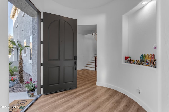 entrance foyer with light wood-type flooring