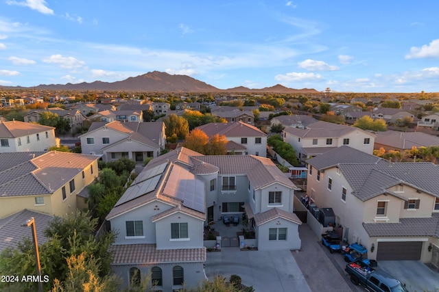 drone / aerial view featuring a mountain view