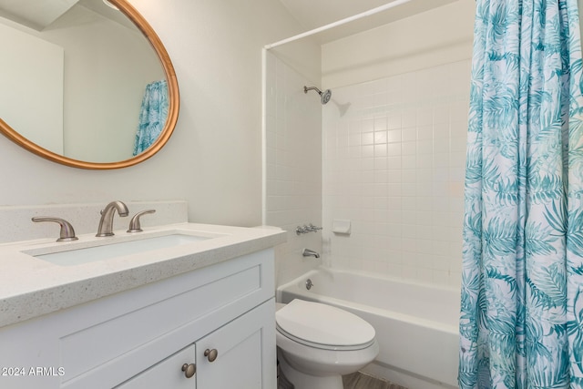 full bathroom with vanity, toilet, and shower / bath combination with curtain