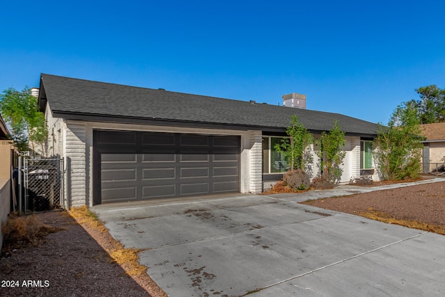 ranch-style house with a garage