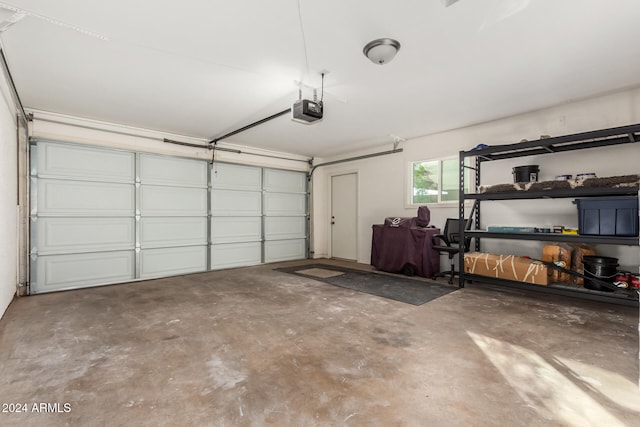 garage featuring a garage door opener