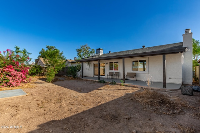 rear view of property with a patio