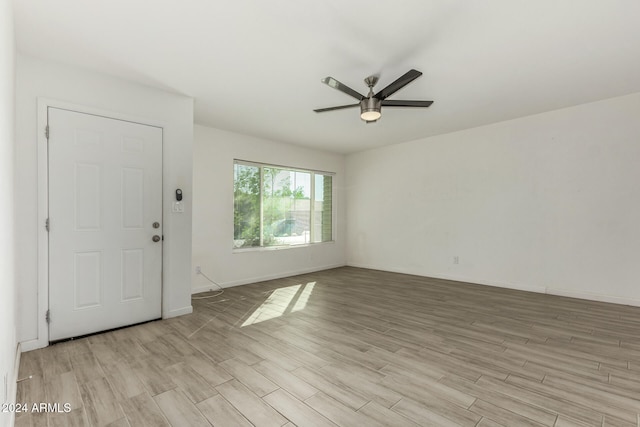 interior space featuring light hardwood / wood-style flooring and ceiling fan