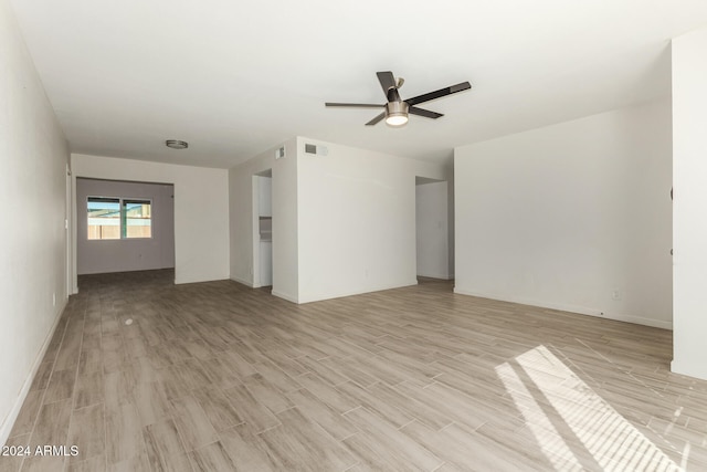 unfurnished room with light hardwood / wood-style floors and ceiling fan