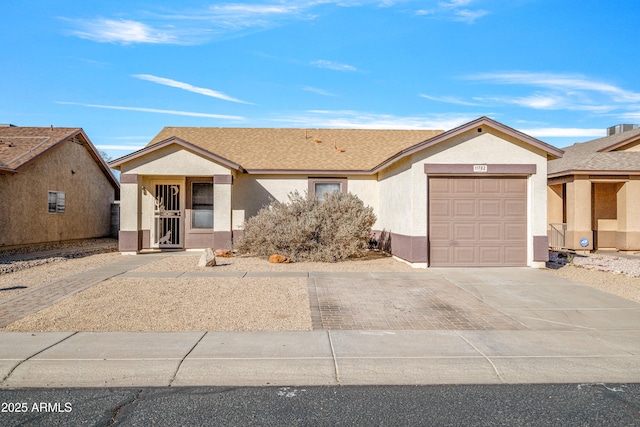 single story home with a garage