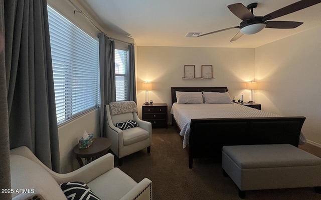 bedroom featuring carpet flooring, a ceiling fan, and visible vents