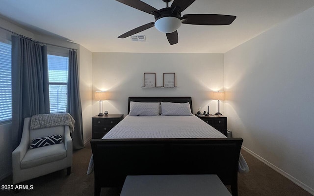 carpeted bedroom featuring visible vents, ceiling fan, and baseboards