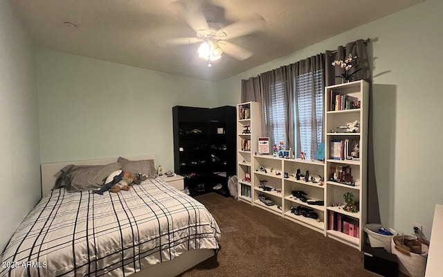 carpeted bedroom with a ceiling fan