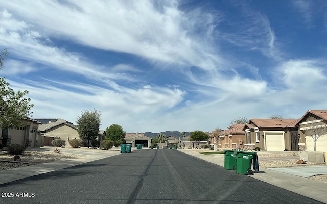 view of road with a residential view