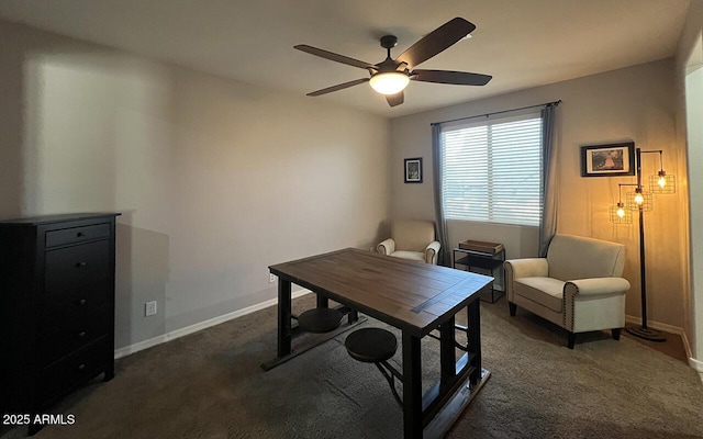 carpeted office with baseboards and ceiling fan