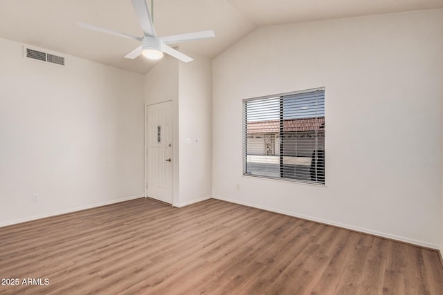 927 E Charleston Ave, Phoenix, AZ 85022 - spare room featuring vaulted ceiling, wood finished floors, a ceiling fan, and baseboards