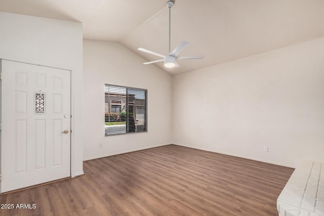 927 E Charleston Ave, Phoenix, AZ 85022 - empty room with a ceiling fan, wood finished floors, vaulted ceiling, and baseboards
