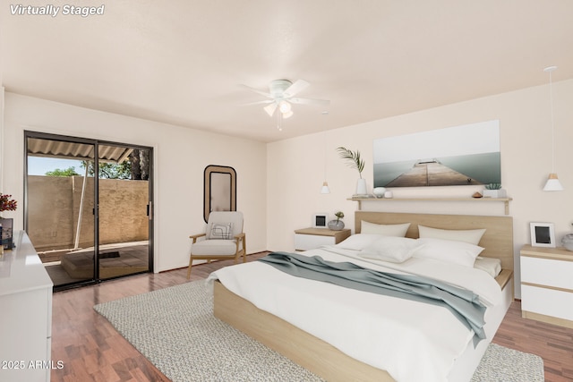 927 E Charleston Ave, Phoenix, AZ 85022 - bedroom with access to exterior, wood finished floors, and a ceiling fan