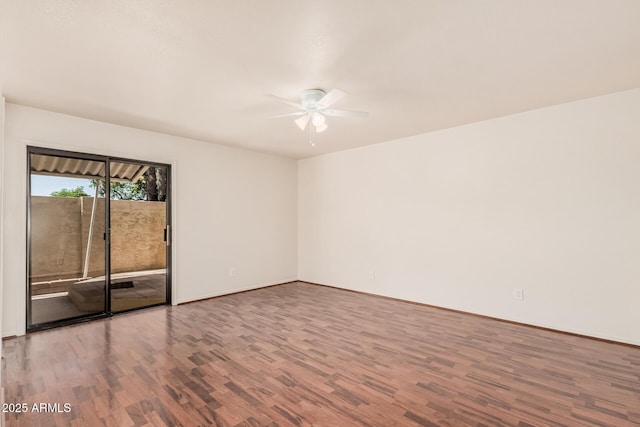 927 E Charleston Ave, Phoenix, AZ 85022 - empty room with a ceiling fan, wood finished floors, and baseboards