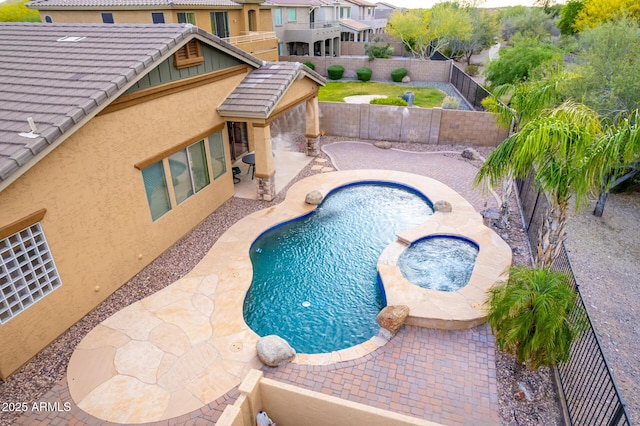 12702 W Dove Wing Way, Peoria, AZ 85383 - view of pool featuring a patio, a fenced in pool, and a fenced backyard