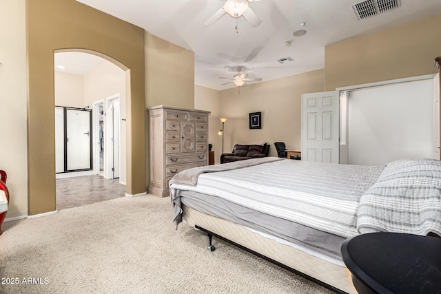 12702 W Dove Wing Way, Peoria, AZ 85383 - bedroom with carpet floors, arched walkways, a ceiling fan, and visible vents