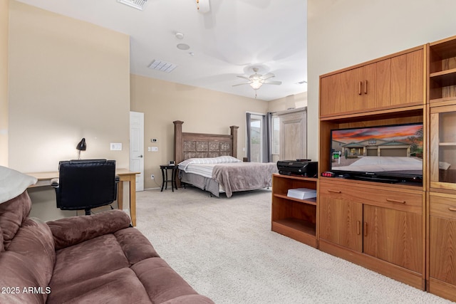 12702 W Dove Wing Way, Peoria, AZ 85383 - bedroom with visible vents, ceiling fan, and light carpet