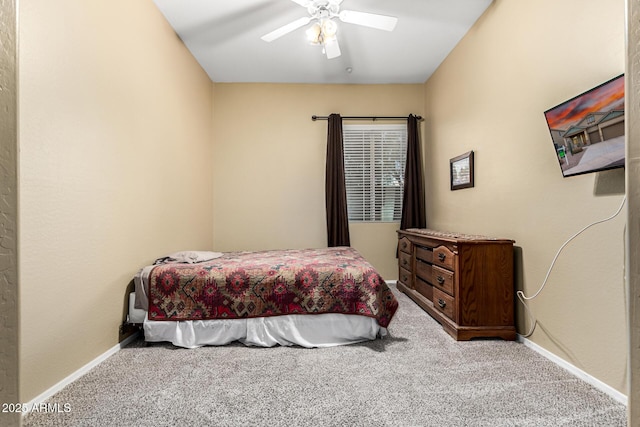 12702 W Dove Wing Way, Peoria, AZ 85383 - carpeted bedroom featuring a ceiling fan and baseboards