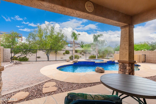 12702 W Dove Wing Way, Peoria, AZ 85383 - view of pool featuring a patio, an in ground hot tub, a fenced in pool, and a fenced backyard