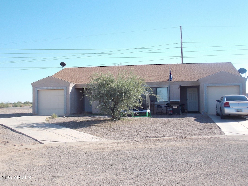 single story home featuring a garage