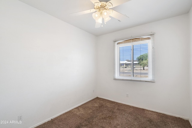 empty room with carpet floors and ceiling fan