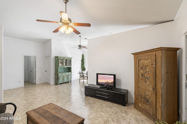 living room with light tile patterned floors and ceiling fan