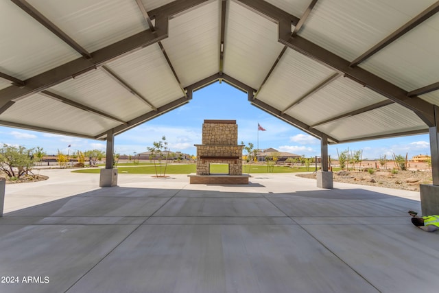 1432 W Ridge Rd, Apache Junction, AZ 85120 - view of patio / terrace featuring an outdoor brick fireplace