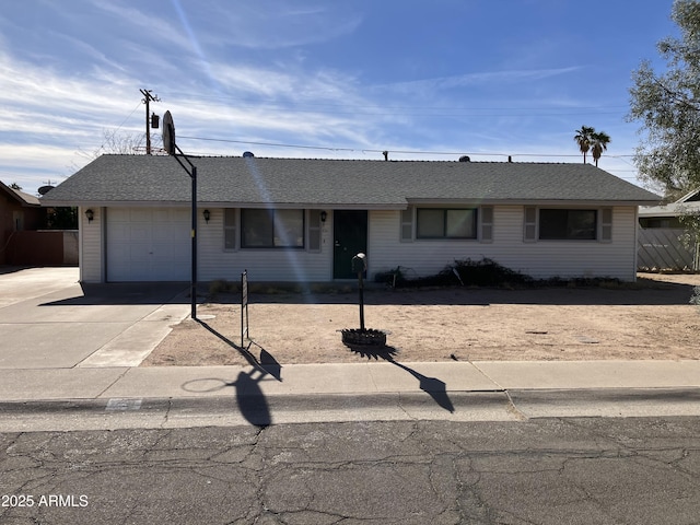 single story home with a garage